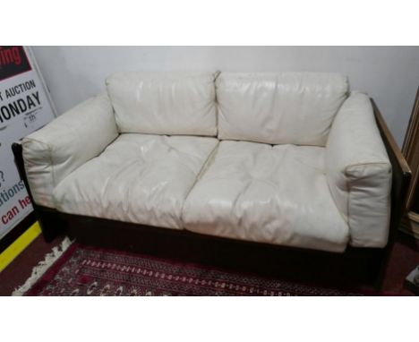 A 1970's white leather sofa by Tobia Scarpa in teak frame. L.150 H.54 D.76cm 