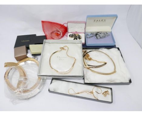 A collection of boxed vintage costume jewellery to include Christian Dior, Monet, Pierre cardin, etc 