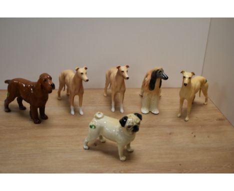 A group of six Beswick Pottery mid-sized dog studies, comprising three Greyhounds 'Champion Jovial Roger' 972, two in light s