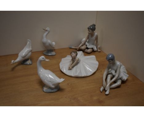 A group of five Nao by Lladro porcelain figurines and bird studies, comprising three ballerina figurines and three goose stud
