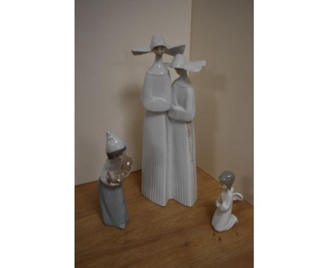 A Lladro porcelain 'Two Nuns' figure group number 4611, printed and impressed marks to base 33cm sold together with a Lladro 