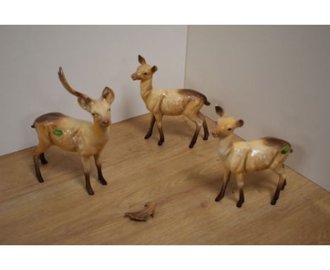 A pair of Beswick Pottery doe's model number 999A, designed by Arthur Gredington, in light brown gloss, 15cm, sold together w