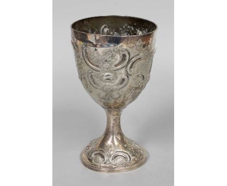 A Victorian Silver Goblet, Maker's Mark Worn, London, 1862, the bowl tapering and on spreading trumpet foot, chased with foli