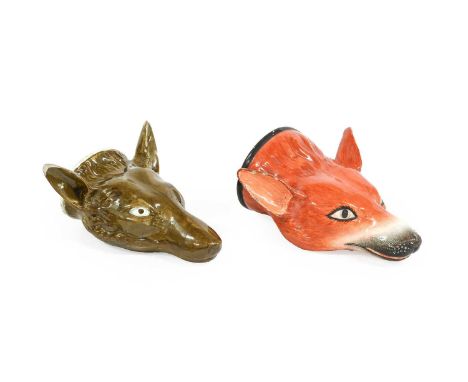 A Pearlware Fox Mask Stirrup Cup, early 19th century, naturalistically modelled and painted,16cm longA Similar Fox Mask Stirr