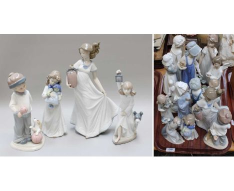 Thirteen Nao Porcelain Figures of Children, various sizes, together with a similar (one tray)