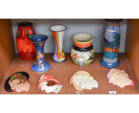 An Amphora Pottery Vase, and Arcadian powder blue ground vase, two Lorna Bailey Pottery Vase, four Art Deco style wall masks 