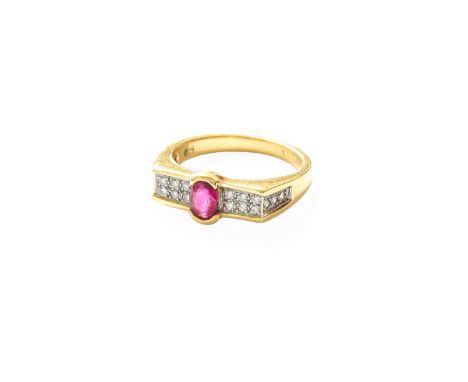 A Ruby and Diamond Ring, the oval cut ruby in a yellow elongated claw setting, to round brilliant cut diamond set shoulders, 