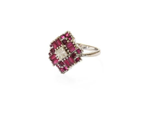 A Ruby and Diamond Cluster Ring, four round brilliant cut diamonds to a stepped border of baguette cut and calibré cut rubies