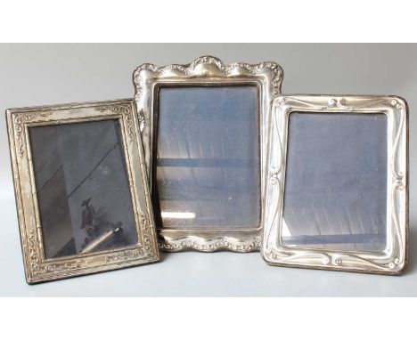 Three Various Elizabeth II Silver Photograph Frames, one by Keyford Frames Ltd., London, 1985, shaped oblong, stamped with fo