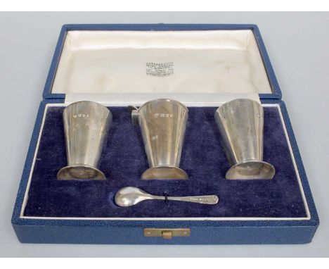A Cased Elizabeth II Silver Condiment-Set, by Garrard and Co. Ltd., London, 1954 and 1955, each piece in the modernist style,