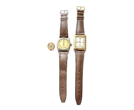 A 9 Carat Gold Rectangular Garrard Wristwatch, Chrome Plated Wristwatch and a 14 Carat Gold Vulcain Watch, (3)