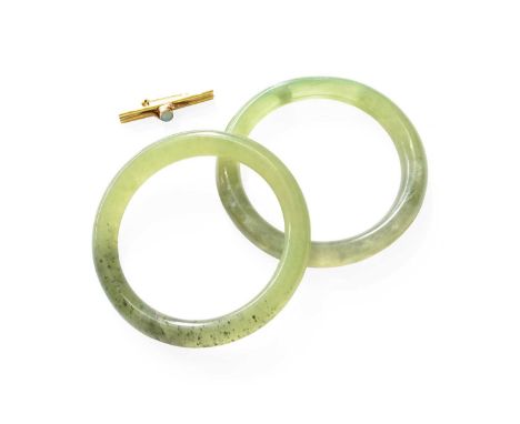 A 22 Carat Gold Opal Brooch, length 3.7cm; and Two Nephrite Bangles, both with inner diameter 6cmBrooch - 5.1 grams. Tow bang