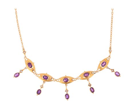 An Art Nouveau 9ct gold amethyst and pearl fringe necklace, circa 1910, each panel rub-over set with oval mixed-cut amethysts