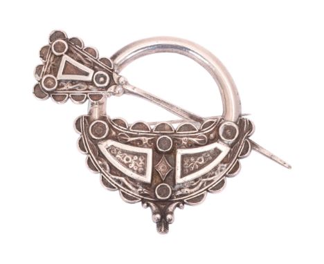 A large Scottish Celtic pennanular cloak pin brooch, unmarked mounts tests as silver, 100mm, 65.7g . Condition Report:General