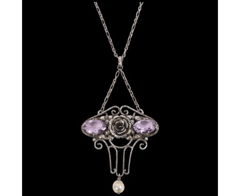 A large Arts and Crafts silver pearl and amethyst floral openwork lavaliere pendant necklace, on silver cable link chain, pen