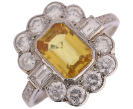 An Art Deco style platinum synthetic yellow sapphire and diamond cluster ring, set with 1.6ct octagonal step-cut synthetic sa
