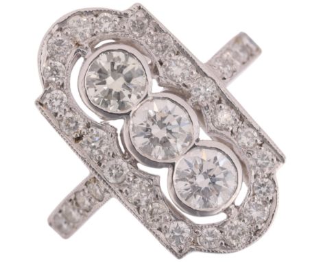 An Art Deco style platinum diamond openwork plaque ring, rub-over and grain set with modern round brilliant-cut diamonds, tot