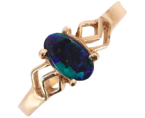 A 14ct gold black boulder opal ring, opal measures approx: 6.37 x 3.85 x 1.31mm, size K, 1.4g . Condition Report:No damage, o