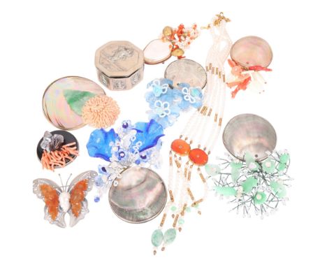 A quantity of South Korean mother-of-pearl shell brooches, pearl necklace, etc . Condition Report:Lot sold as seen unless spe