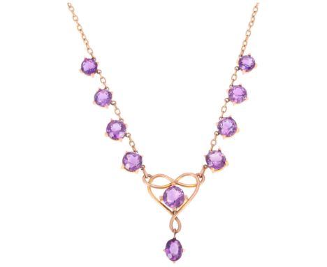 An Antique Victorian 9ct rose gold amethyst heart pendant necklace, circa 1880, set with round and oval-cut amethysts, with c