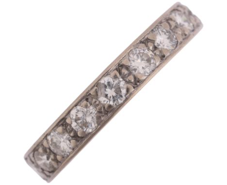 An Art Deco style 18ct white gold diamond full eternity ring, maker B & J, Birmingham 1993, set with modern round brilliant-c
