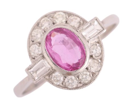An Art Deco style platinum synthetic pink sapphire and diamond cluster ring, millegrain set with 0.6ct oval mixed-cut sapphir