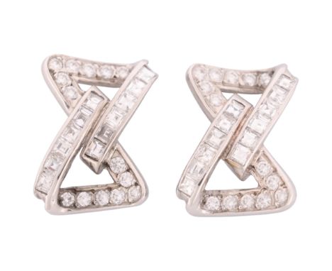 A pair of Art Deco 18ct white gold diamond geometric stud earrings, channel set with carree and transitional-cut diamonds, to