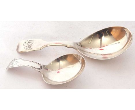 Mixed Lot: a George III silver caddy spoon of small proportions, hallmarked Birmingham 1808, maker's mark IW, together with a