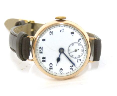 Gents first quarter of 20th century 9ct gold wrist watch, white enamel dial with contrasting black Arabic numerals and a sub-