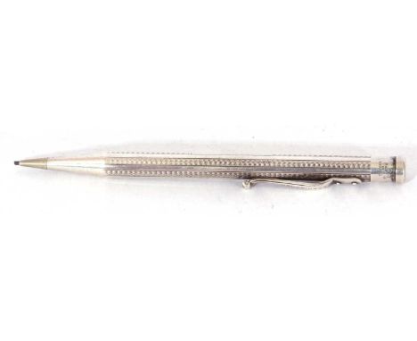Rolled silver propelling pencil decorated with engine turned detail