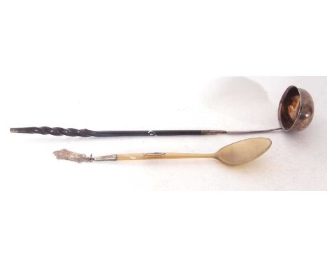 Mixed Lot: Georgian silver and whalebone handle toddy ladle, the oval bowl with coin inset, 38cm long, together with a Victor