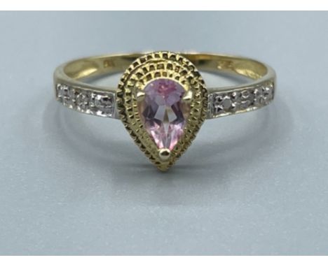 Ladies 9ct gold pink pear stone and diamond ring 1.22g size O