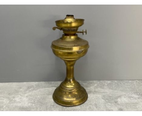 Brass oil lamp. Missing glass