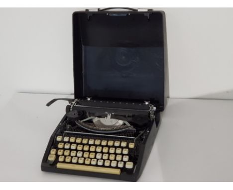 Vintage typewriter in original carrycase
