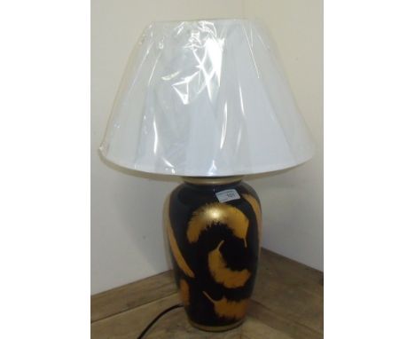 As new ex shop display black gloss table lamp decorated with gold fern leaves with cream shade