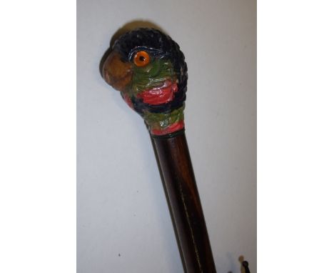 19th / 20th C silk parasol the handle with a parrot finial (total length 69cm)
