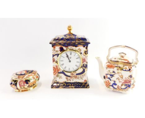 A group of Masons ironstone decorated in the Mandalay pattern, comprising  mantel clock, tea kettle and an oval dressing tabl