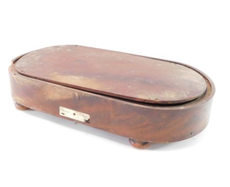 An early Victorian flame mahogany oval musical automaton base, with cover reveals a fitted mechanism, front plaque marked cha