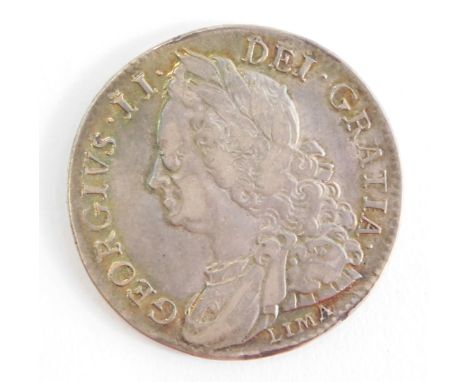 A George II half crown 1746, minted from silver captured by Admiral Anson at Lima during his circumnavigation. 