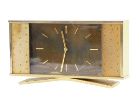 An Ahof mid century brass cased mantel clock, with a rectangular dial in a brushed gold finish casing, with Swiss movement, 8