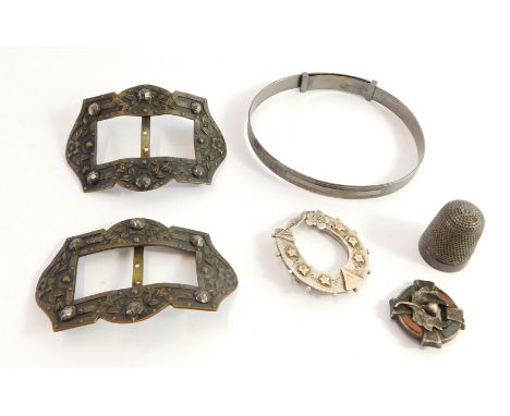 A group of Victorian and later jewellery, to include a silver horseshoe brooch, two steel floral belt buckles, a silver and a