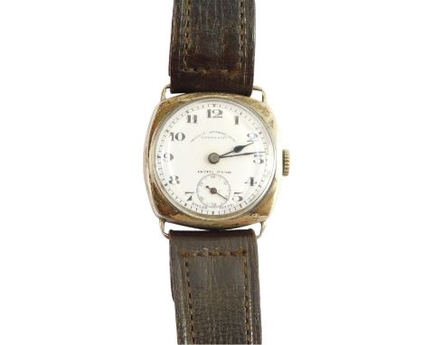 A T Fargatt silver gentleman's wristwatch, with circular white enamel dial, in a square silver casing on a brown leather stra