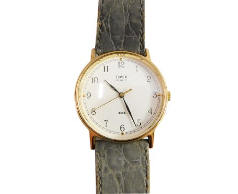 A Timex quartz gentleman's wristwatch, with gold plated outer case on a stainless steel back, with cream coloured dial, on a 