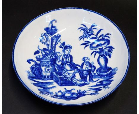 A Worcester First period blue and white porcelain saucer, decorated in the Mother &amp; Child pattern, open crescent mark, 12