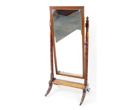 An early 19thC mahogany cheval mirror, with rectangular mirror plate, with multi layered border, on turned supports, raised o