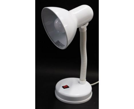 A white Power Master anglepoise desk lamp. 