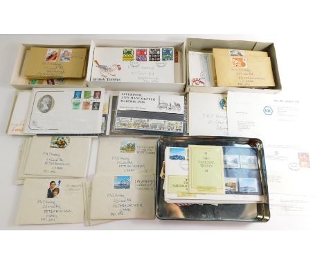 A group of stamps and first day covers. 