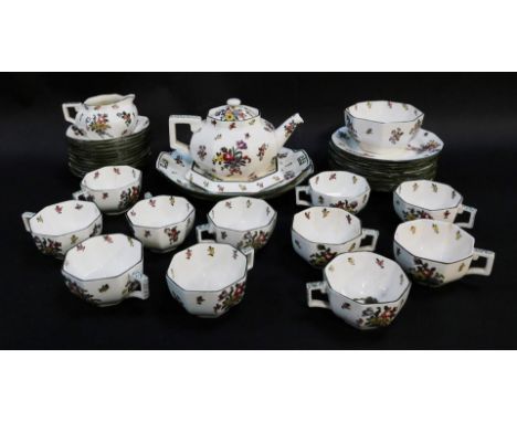 A Royal Doulton Old Leeds Spray pattern part tea service, comprising teapot and stand, eleven tea cups and saucers, milk jug,