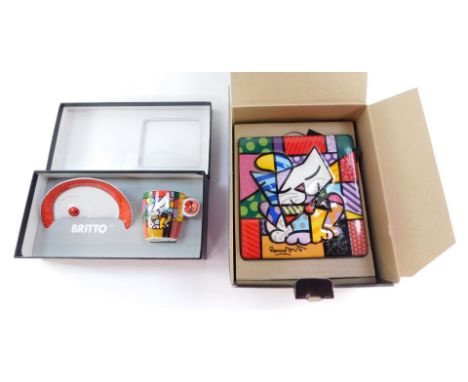 A Goebel Britto blue cat plaque, designed by Romero Britto for Artists Orbis 2010, together with a similar demitasse coffee c