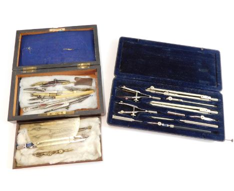 Two compass sets, comprising a composite set in a rosewood box, and a later German set, boxed. (2)